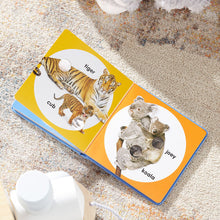Load image into Gallery viewer, Poke-A-Dot: Wild Animal Families Board Book
